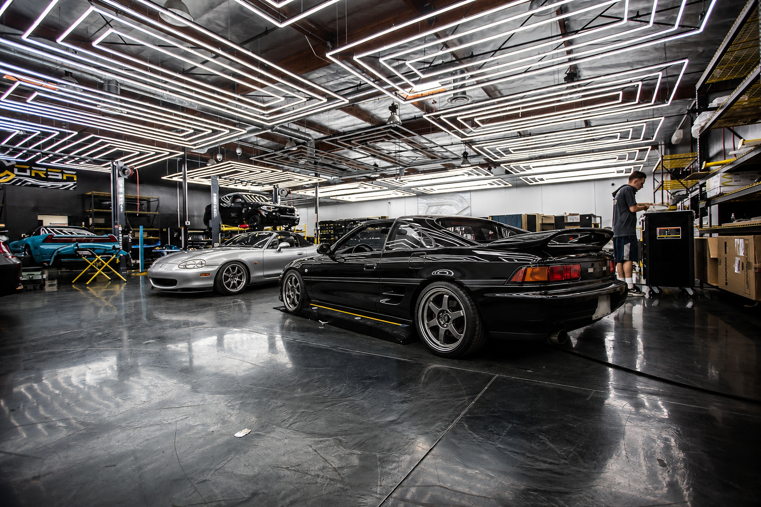 Toyota MR2 SW20 y Mazda MX-5 NB en taller